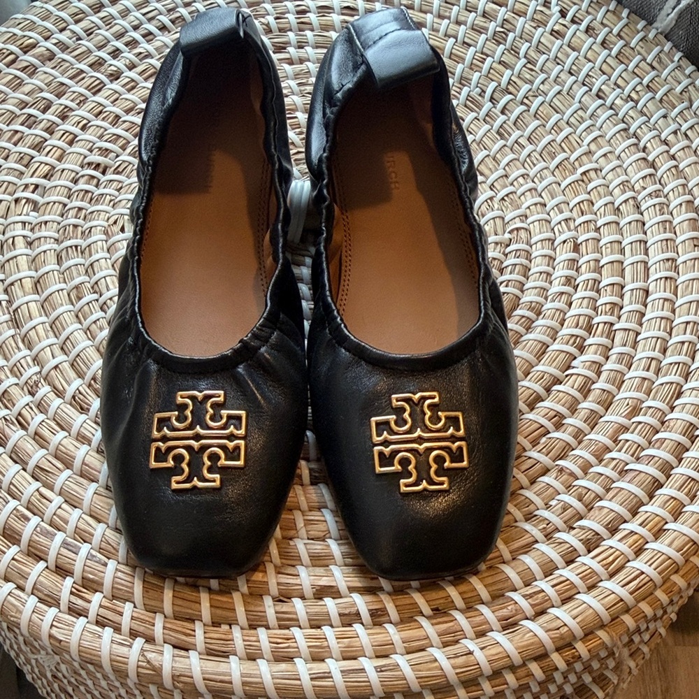 Tory Burch Black Flats with Gold Emblem